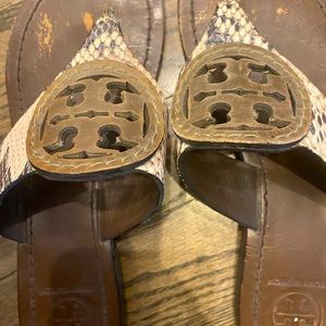 Size 6 Tory Burch sandals- the worn spots on the sole are covered by your foot.